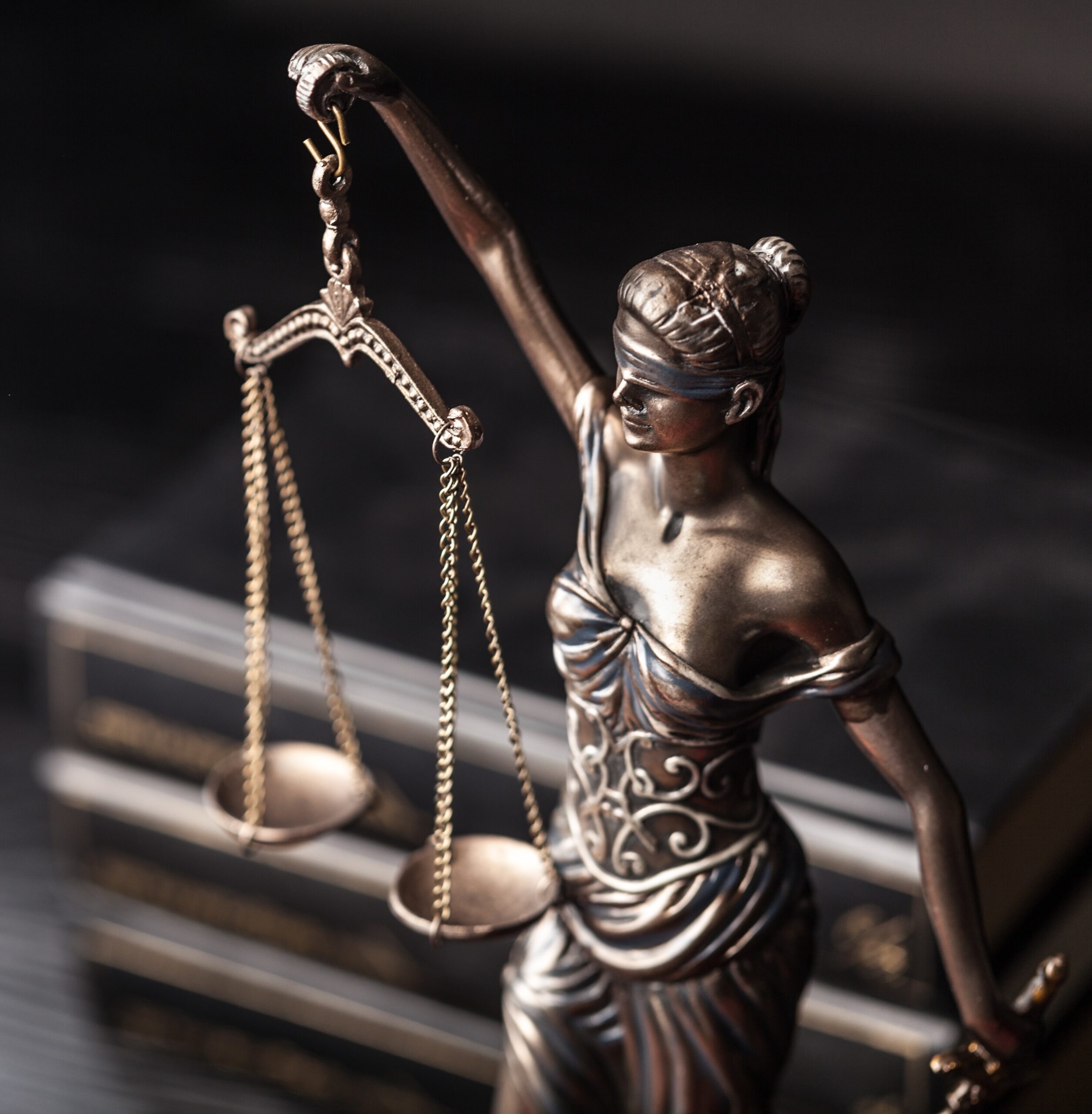 Closeup of a sculpture of Themis, mythological Greek goddess, symbol of justice,